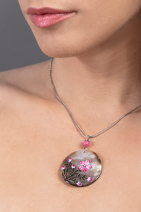 Cerias Diva necklace with sun shaped pendant