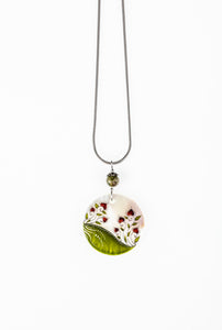 Tendrill Decent necklace with sun shaped pendant