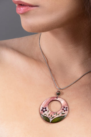 Gilnith Diva necklace with pierced-sun shaped pendant